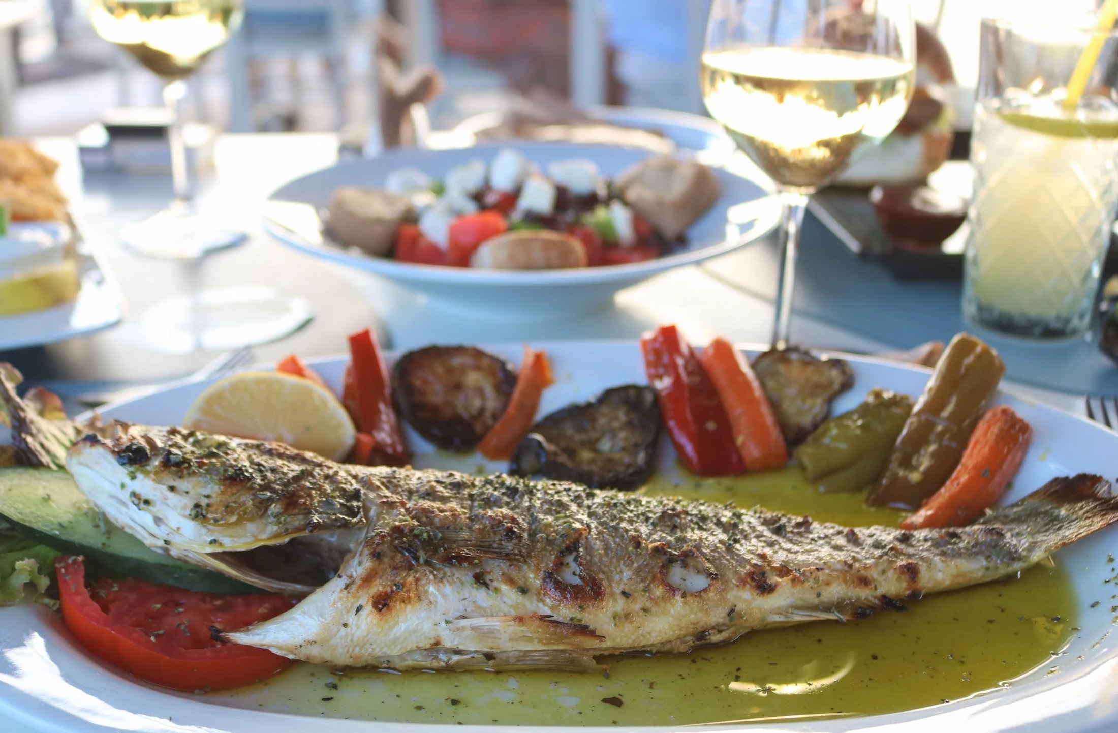 Fresh grilled fish and local wine