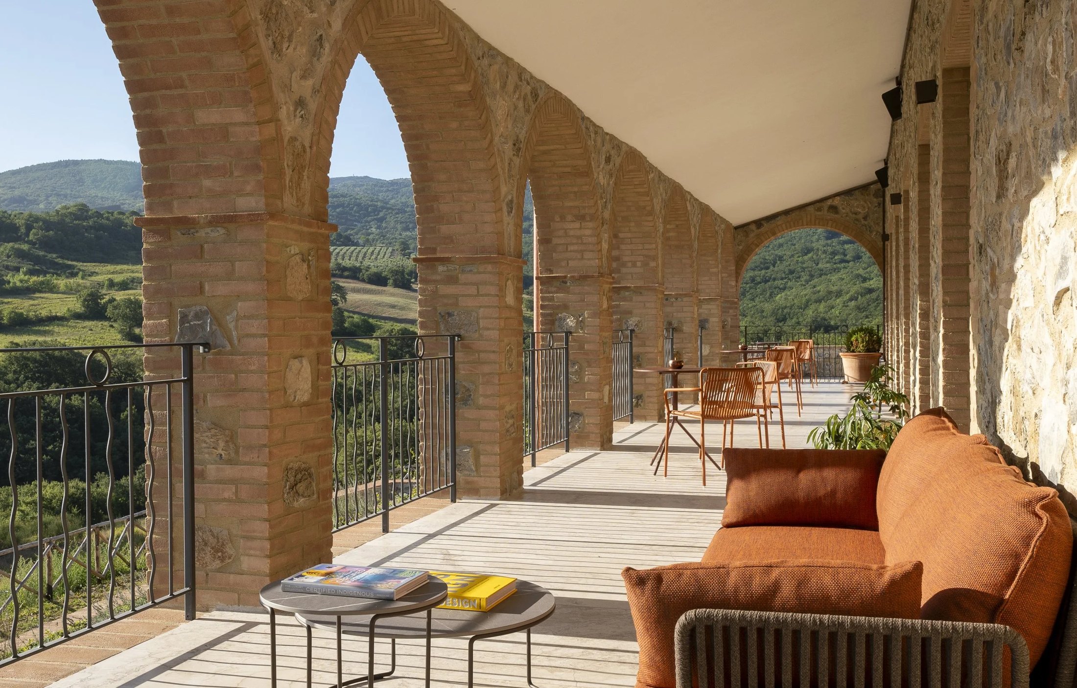 An arched loggia with views across the countryside