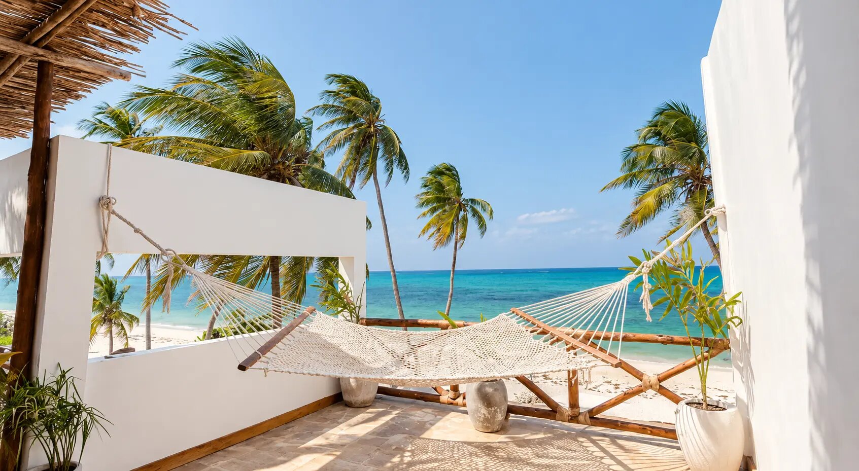 Hammock strung on the terrace above the beach