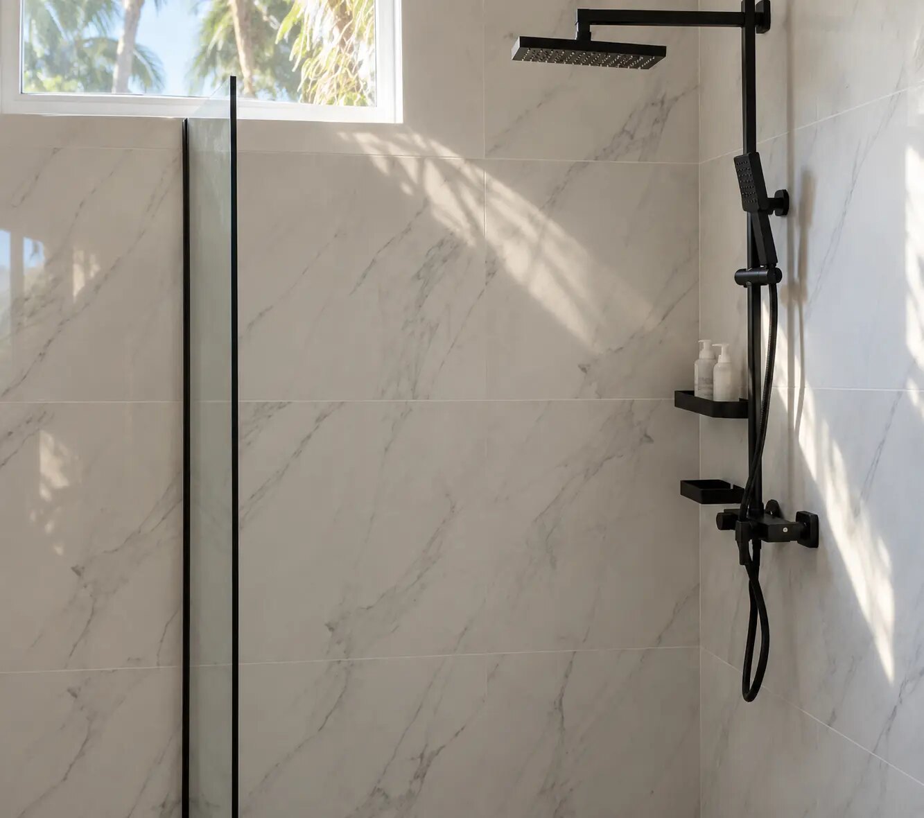 Marble bathroom with a matte black rainfall shower